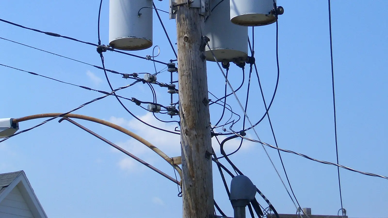 Transformer bank on a utility pole, a common way to supply power in North America